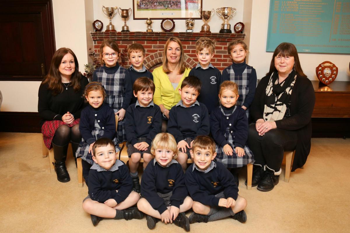 Reception children at Dumpton School in Colehill with teacher Sharon Morton, centre, and TA's Sophie Skinner and Carol Hargreaves.