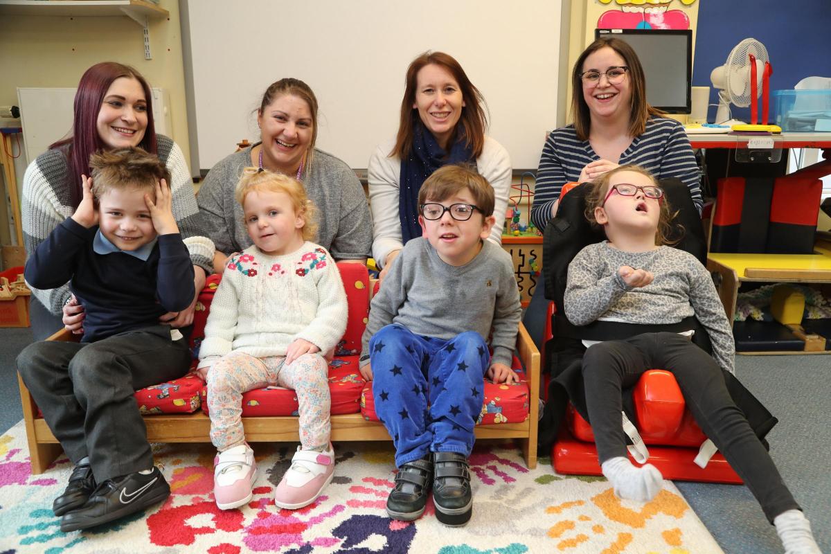 Reception class pupils at Victoria Education Centre with  ESW Hannah Baker, ESW Lisa Moore, teacher Lois Main and TA Corinne Kenward.