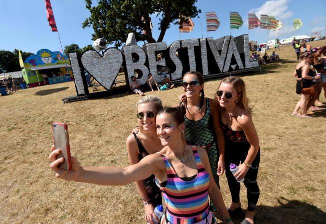 Festival goers take a selfie. Image by Finnbarr Webster Photography